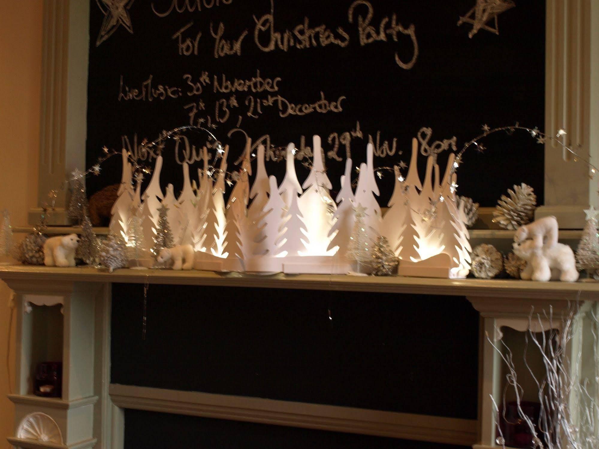 The Bower Inn Bridgwater Eksteriør bilde A fireplace decorated for Christmas